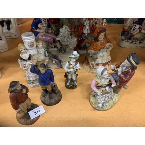 311 - A LARGE GROUP OF STAFFORDSHIRE FIGURINES TO INCLUDE A CROWN STAFFORDSHIRE PIED PIPER OF HAMELIN