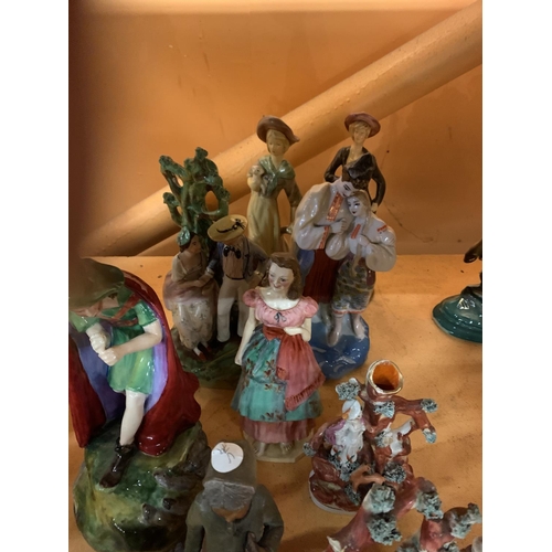 311 - A LARGE GROUP OF STAFFORDSHIRE FIGURINES TO INCLUDE A CROWN STAFFORDSHIRE PIED PIPER OF HAMELIN