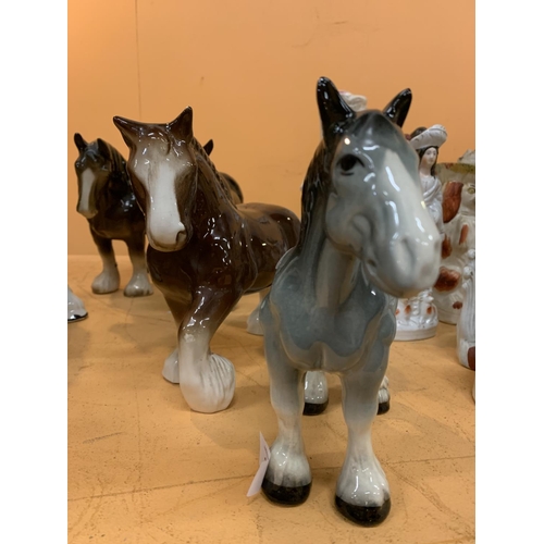 314 - SIX EXAMPLES OF STAFFORDSHIRE CERAMIC SHIRE HORSES