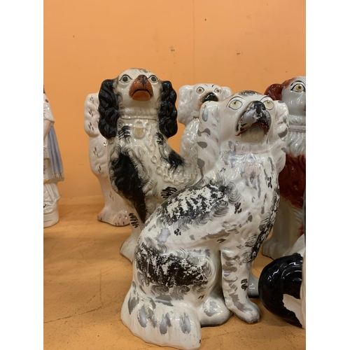 321 - A SELECTION OF EIGHT VARIOUS STAFFORDSHIRE FLATBACK SPANIELS