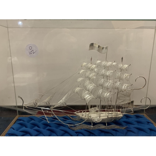 839 - A MODEL OF A GALLEON IN A DISPLAY CASE