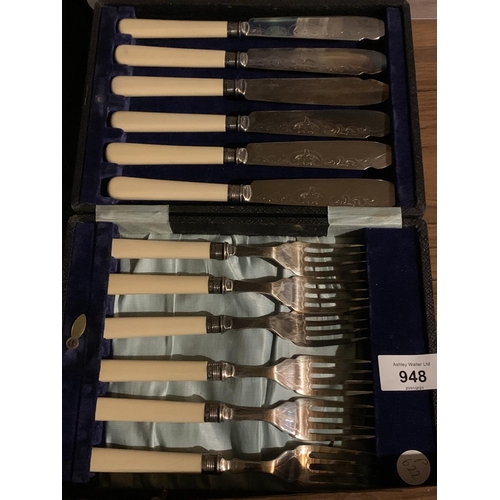 948 - AN ASSORTMENT OF FLATWARE TO INCLUDE FISH FORKS AND KNIVES AND OTHER VARIOUS CUTLERY