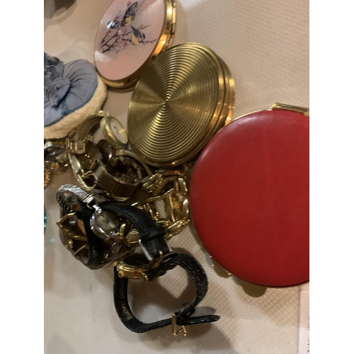 957 - AN ASSORTMENT OF COMPACT MIRRORS AND PERFUMES ETC