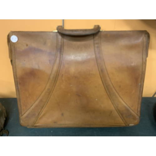 191 - A VINTAGE LEATHER BRIEFCASE