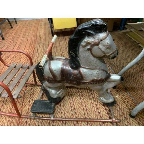 217 - A  CHILD'S METAL ROCKING HORSE CIRCA 1950S