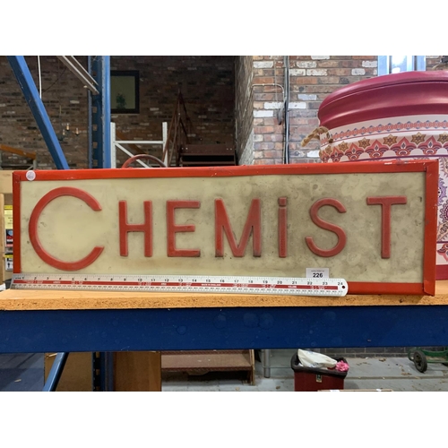 226 - AN ILLUMINATED 'CHEMIST' SIGN