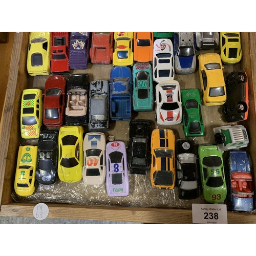 238 - A WOODEN TRAY OF TOY CARS