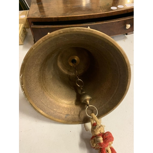 255 - A LARGE BRASS BELL WITH ROPE