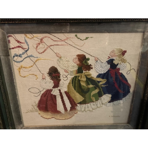 259 - A FRAMED NEEDLEWORK PICTURE DEPICTING THREE GIRLS