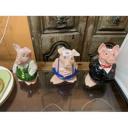 325 - A FAMILY OF FIVE NAT WEST PIG MONEY BOXES