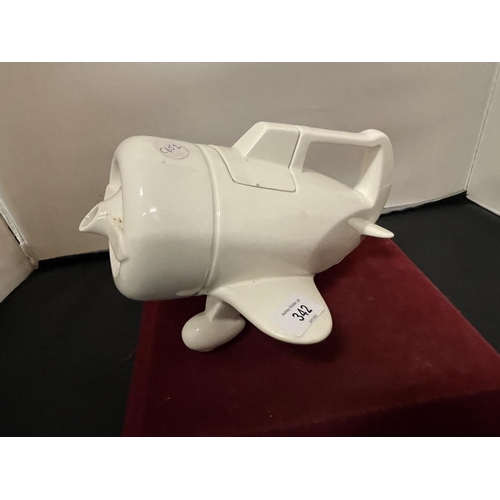 342 - A RETRO 1978 WHITE CERAMIC VANDOR TEA POT IN THE FORM OF AN AEROPLANE