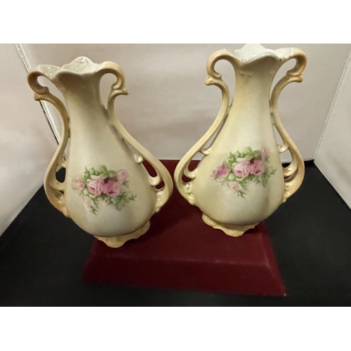 361 - A PAIR OF VINTAGE DECORATED TWIN HANDLED VASES