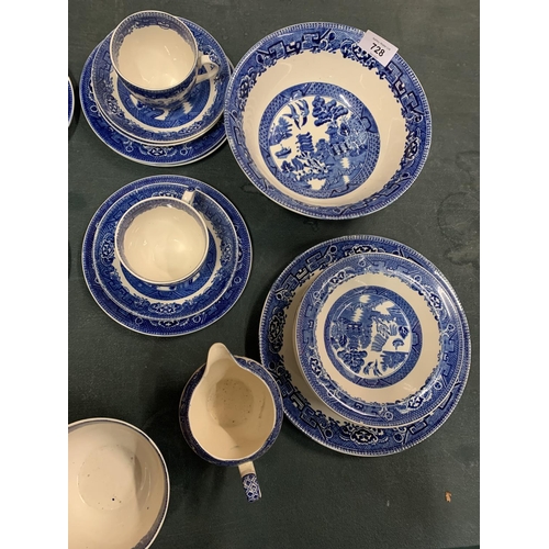 728 - A QUANTITY OF WILLOW PATTERN BLUE AND WHITE TEA WARE TO INCLUDE A SERVING BOWL AND DESSERT DISHES