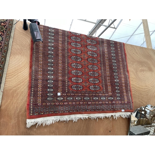 1896 - A RED PATTERNED RUG