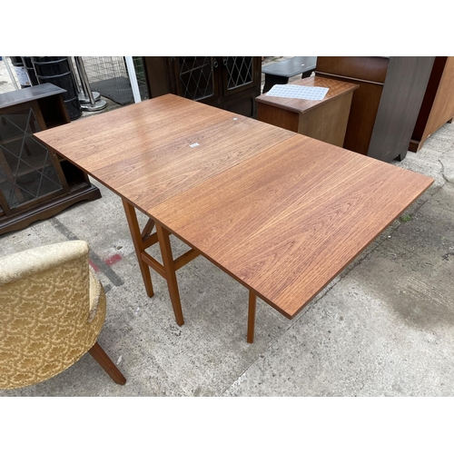 2434 - A RETRO TEAK DROP-LEAF DINING TABLE