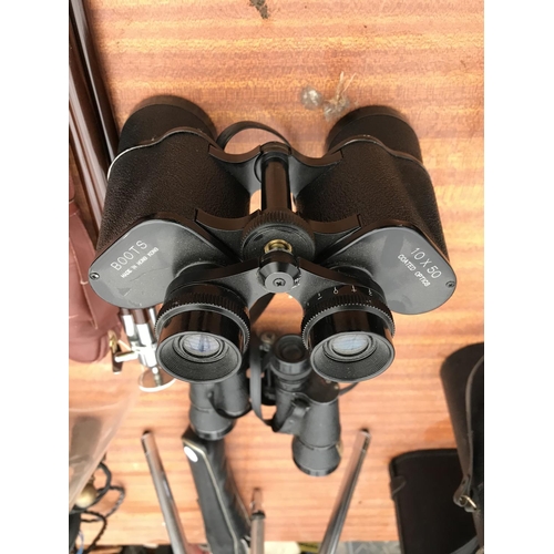 1526 - TWO PAIRS OF BINOCULARS AND TWO CAMERA TRI-PODS