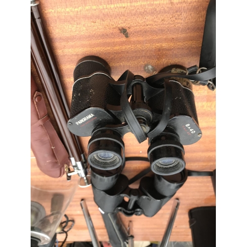 1526 - TWO PAIRS OF BINOCULARS AND TWO CAMERA TRI-PODS