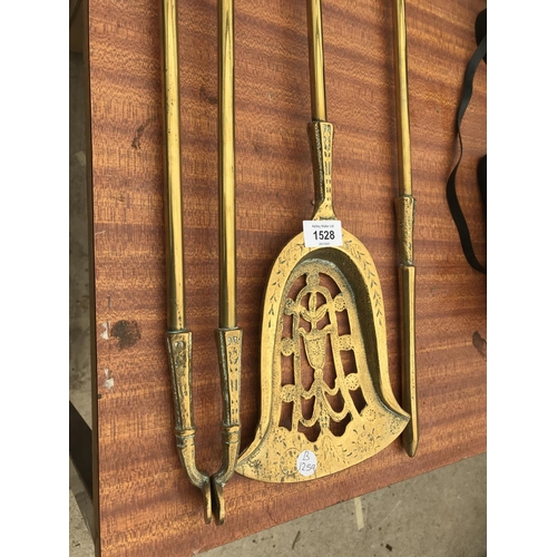 1528 - A BRASS FIRESIDE COMPANION SET AND A BRASS BIKE HORN