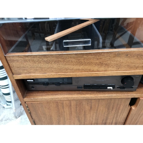 1559 - A TECHNICS TURNTABLE AND SOUNDSYSTEM IN A WOODEN CABINET WITH A PAIR OF SPEAKERS