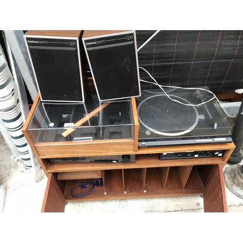 1559 - A TECHNICS TURNTABLE AND SOUNDSYSTEM IN A WOODEN CABINET WITH A PAIR OF SPEAKERS