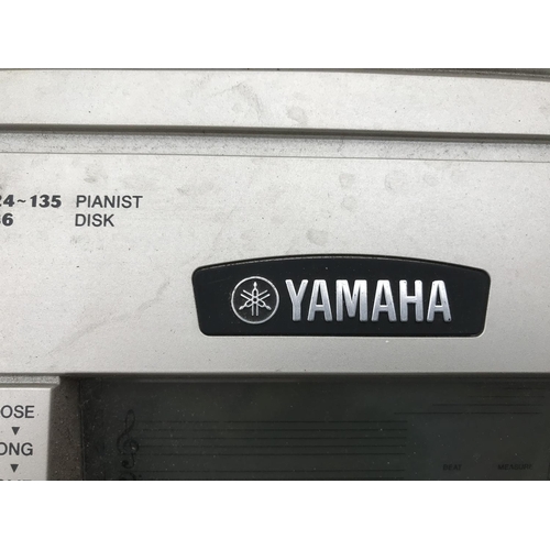 1584 - A YAMAHA ELECTRIC KEYBOARD