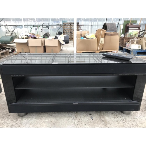 1625 - A SONY SOUNDBAR GLAZED MONITOR STAND WITH LOWER SHELF