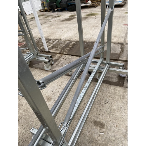 1657 - THREE GALVANISED TRESTLES