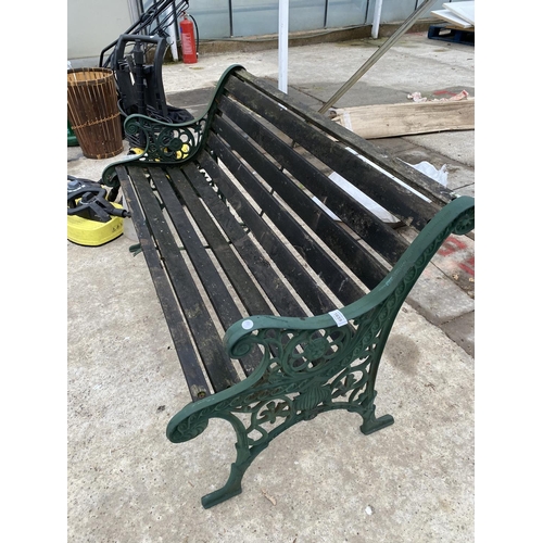 1659 - A GARDEN BENCH WITH CAST IRON ENDS