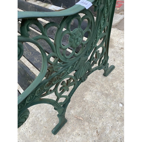 1659 - A GARDEN BENCH WITH CAST IRON ENDS