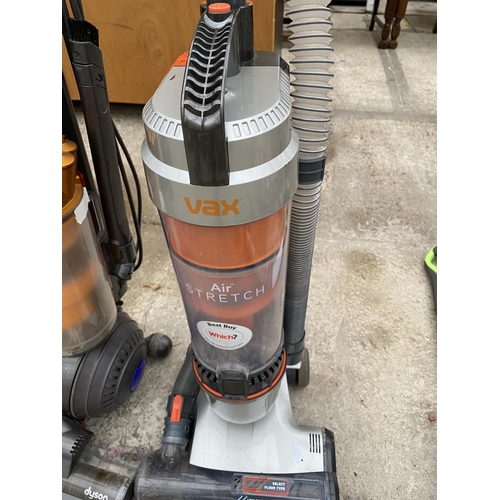 1676 - TWO VACUUM CLEANERS - A DYSON DC 40 AND A VAX