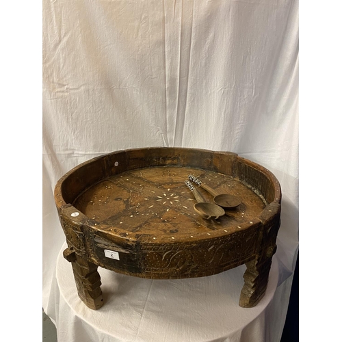 2 - A VERY LARGE HEAVILY CARVED 19TH CENTURY AFGHAN TRIBAL BOWL ON FOUR LEGS AND A PAIR OF WOODEN SERVER... 