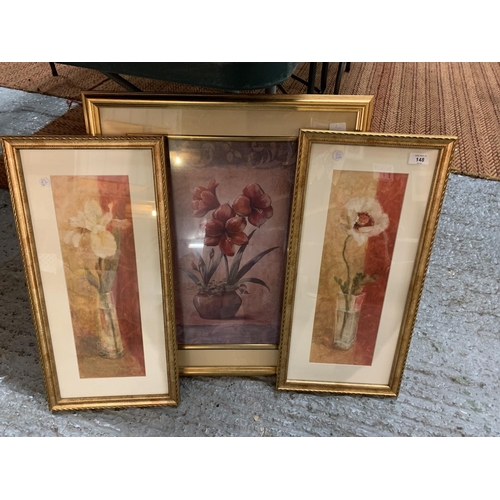 148 - THREE GILT FRAMED PICTURES DEPICTING FLOWERS