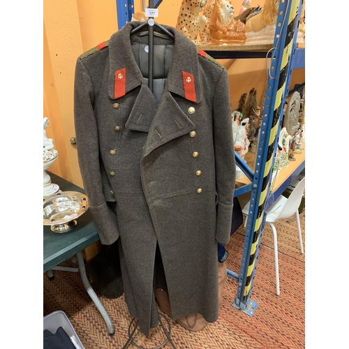 177 - A VINTAGE SOVIET RUSSIAN ARMY GREAT COAT TO INCLUDE A STEEL STAND