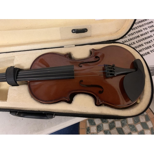 247 - A CASED HALF VIOLIN