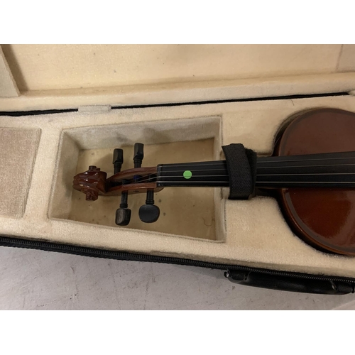 247 - A CASED HALF VIOLIN