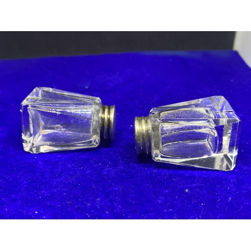 602 - A PAIR OF MINATURE SILVER TOPPED GLASS CRUETS