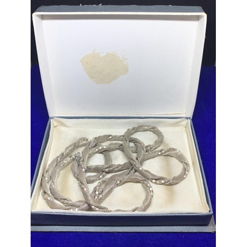 656 - A SILVER TWIST DESIGN NECKLACE WITH PRESENTATION BOX