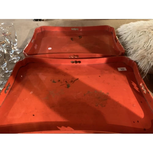 829 - TWO ORIENTAL RED LACQUERED SERVING TRAYS