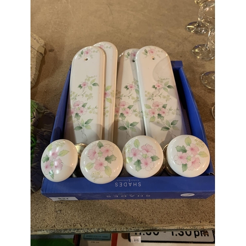 831 - A COLLECTION OF CERAMIC DOOR KNOBS AND FINGER PLATES