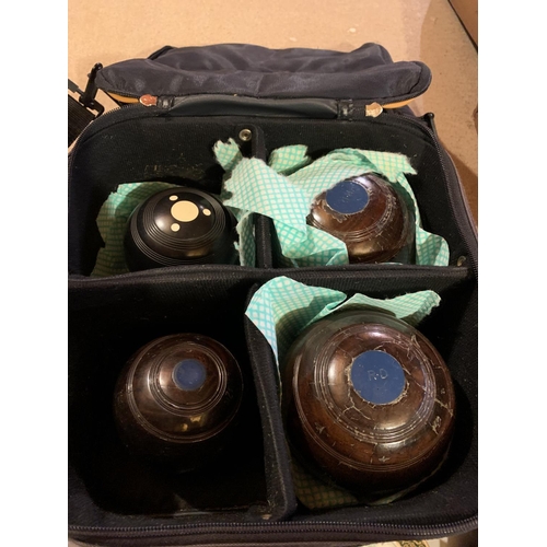 874 - A VINTAGE CASED SET OF CROWN GREEN BOWLS TAYLORS