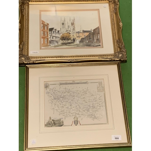 986 - A FRAMED WATERCOLOUR OF CENTRAL LINCOLN AND A FRAMED MAP OF BRISTOL AND BATH