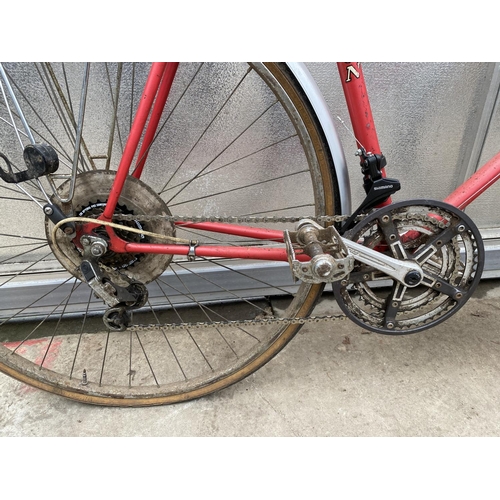 1308 - A VINTAGE HENRY BURTON ROAD RACING BIKE WITH 12 GEARS