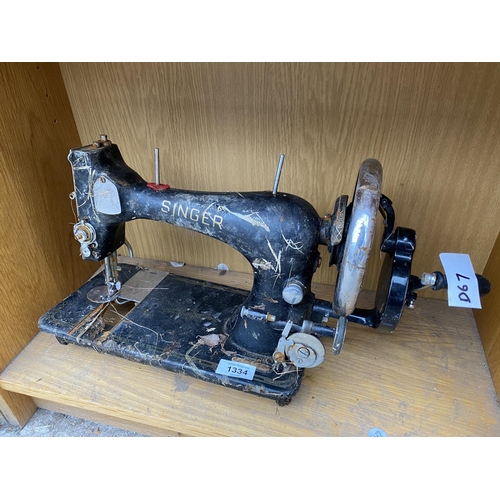 1334 - A VINTAGE SINGER SEWING MACHINE