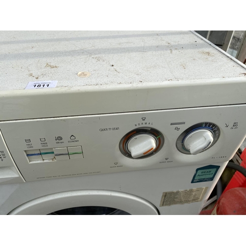 1811 - A WHITE ZANUSSI WASHING MACHINE BELIEVED IN WORKING ORDER BUT NO WARRANTY