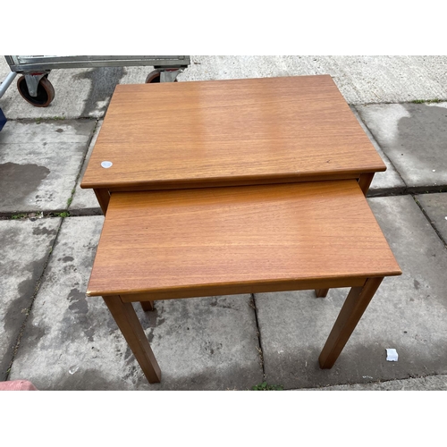 2414 - A DRESSING STOOL, NEST OF TWO TABLES AND AN OVAL COFFEE TABLE