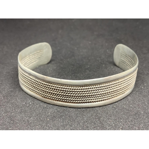 505 - TWO ASIAN SILVER BANGLES