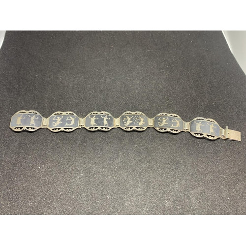 513 - A SIAM SILVER BRACELET MARKED