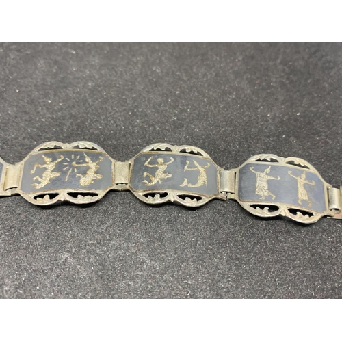 513 - A SIAM SILVER BRACELET MARKED