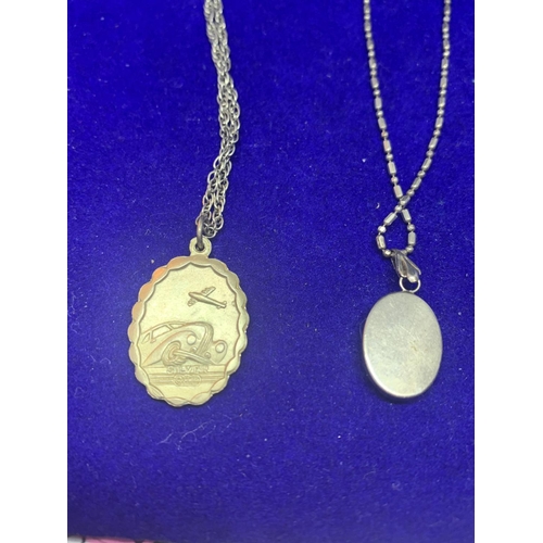 533 - FOUR SILVER NECKLACES WITH PENDANTS TO INCLUDE A ST CHRISTOPHER, BLUE CAMEO, FLOWER ETC