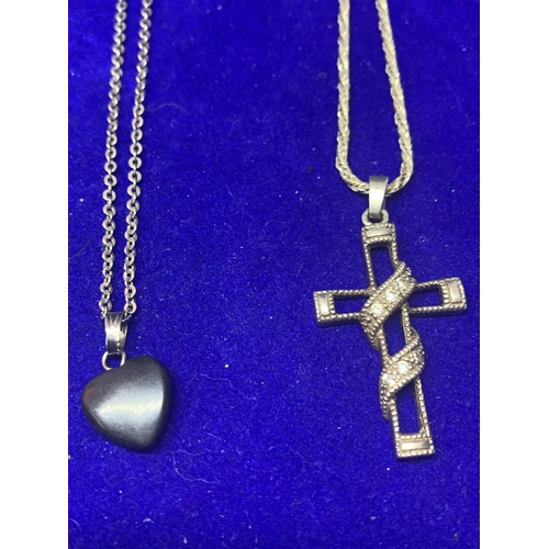 547 - FOUR SILVER NECKLACES MARKED 925 WITH PENDANTS TO INCLUDE A CROSS, HEART, INGOT AND OVAL SHELL DESIG... 